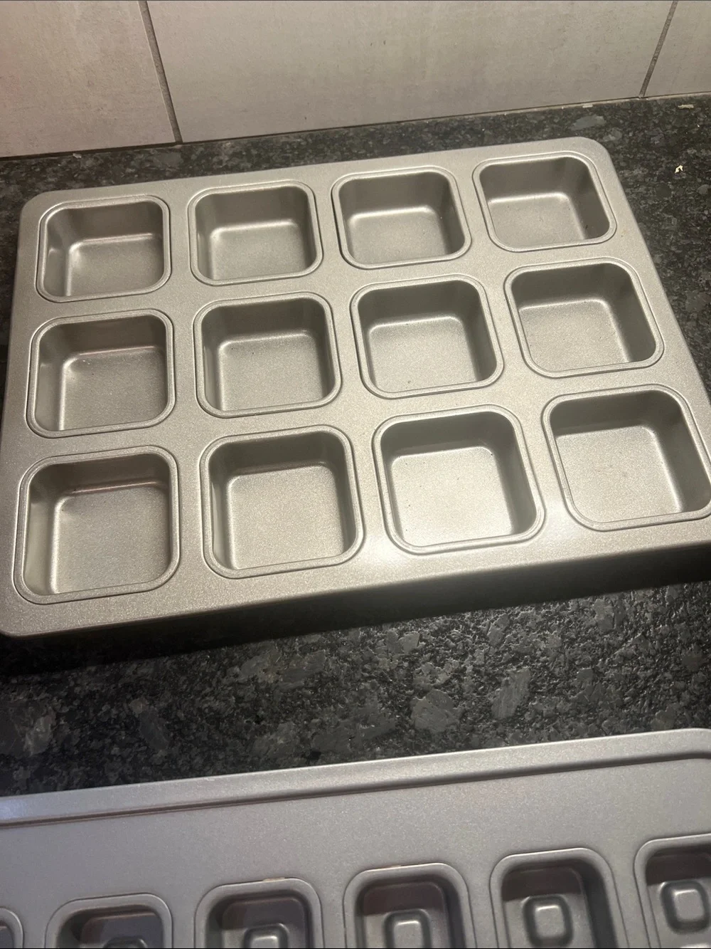 Pampered Chef Waffle Baking Pan. And a brownie pan too. Non stick. Great shape